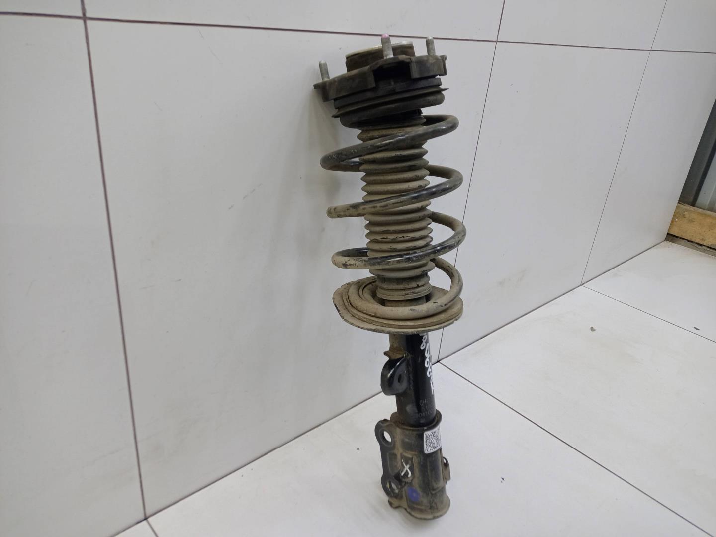 Амортизатор передний левый