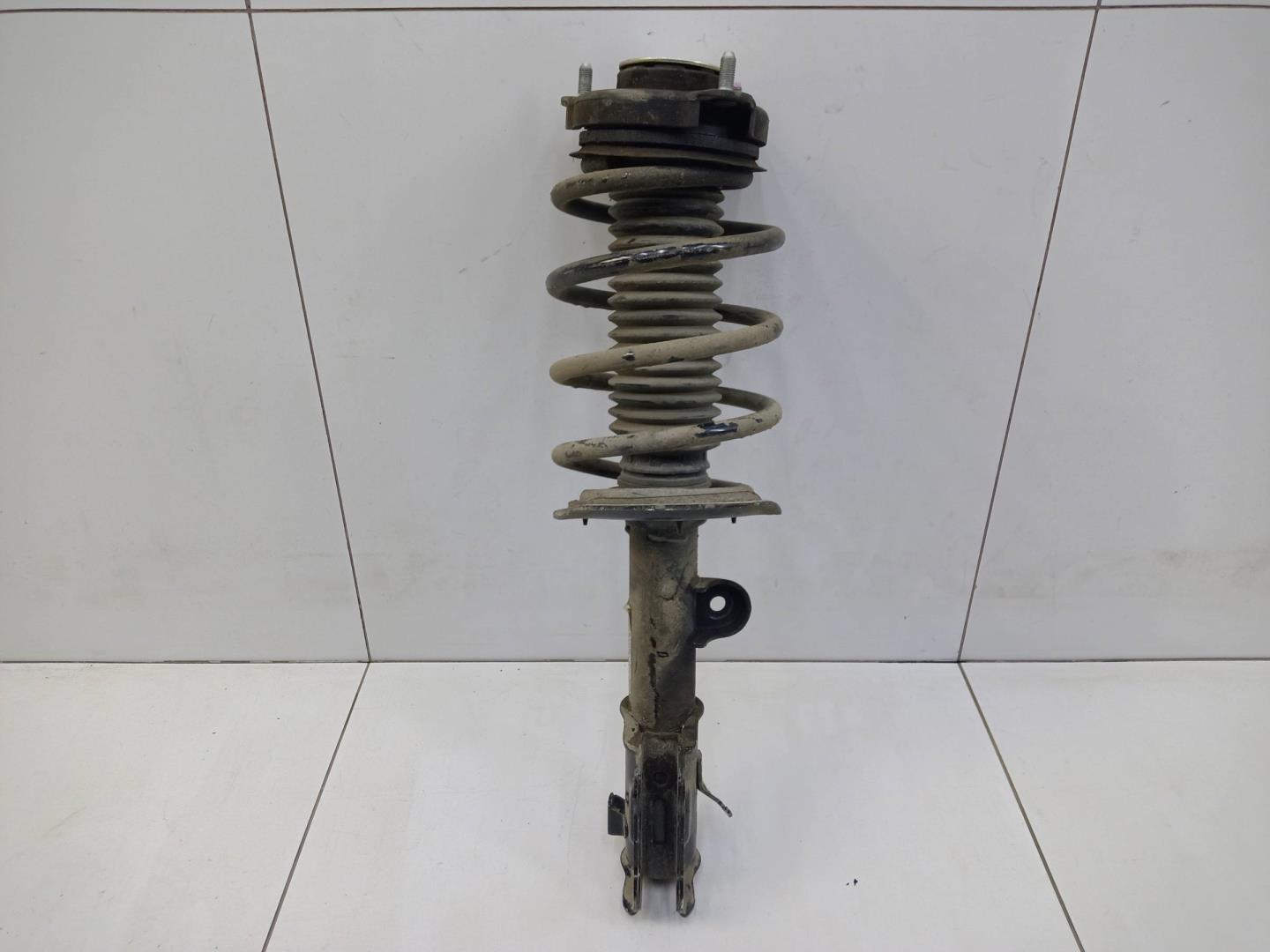 Амортизатор передний левый