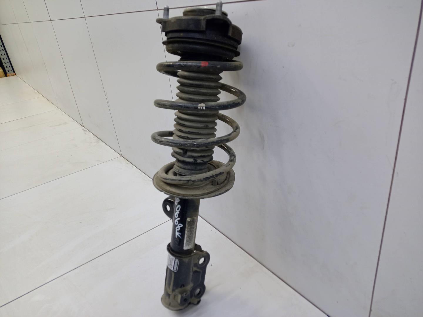 Амортизатор передний левый