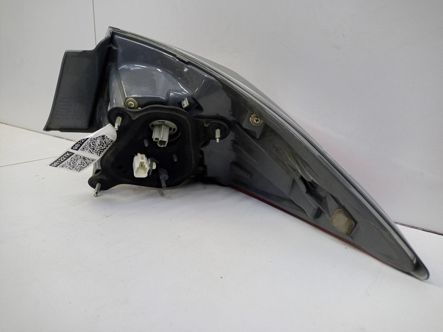 Фонарь задний наружный левый