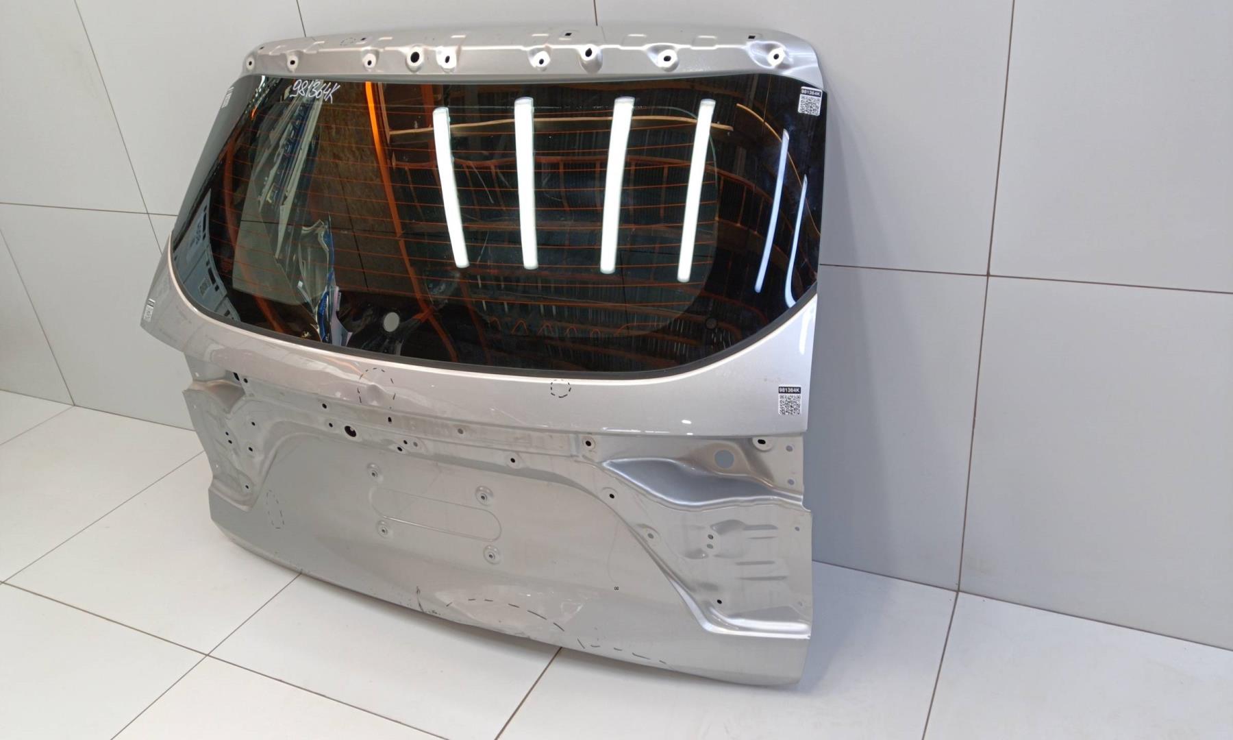 Стекло двери багажника