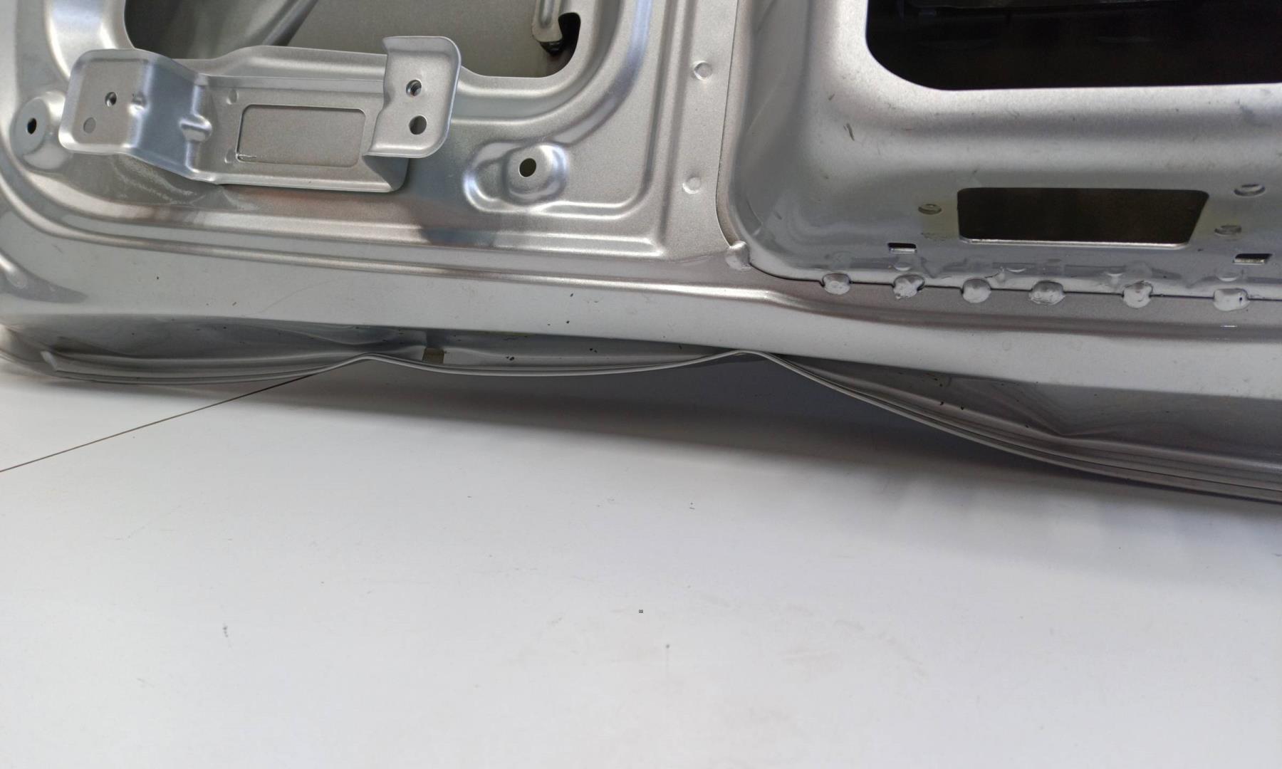 Стекло двери багажника