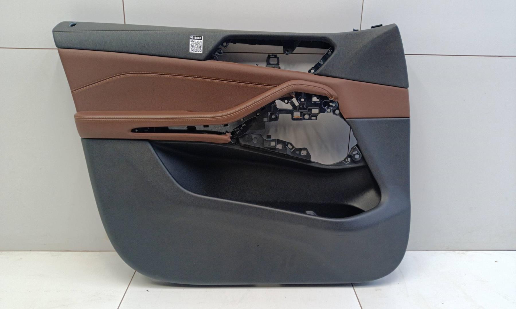 Обшивка двери передней левой