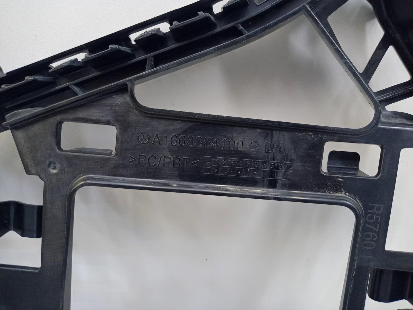 Кронштейн заднего бампера левый