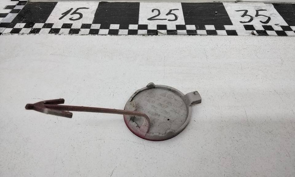 Заглушка буксировочного крюка