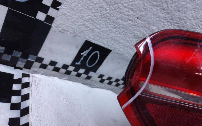 Фонарь задний наружный левый