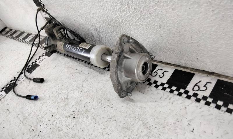 Амортизатор задний левый