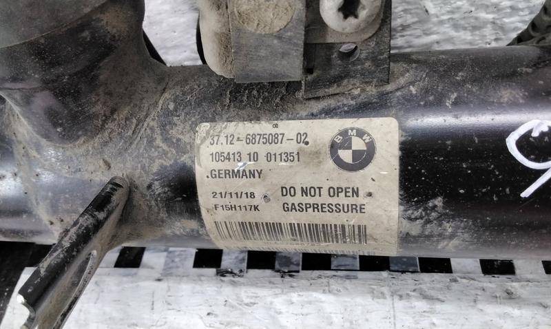 Амортизатор задний левый