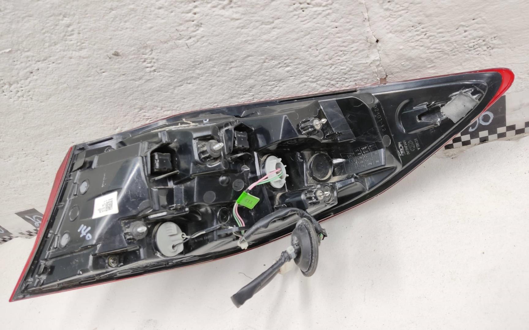 Фонарь задний наружный левый