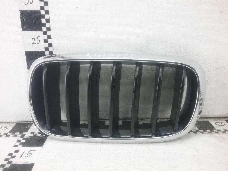 Решетка радиатора левая