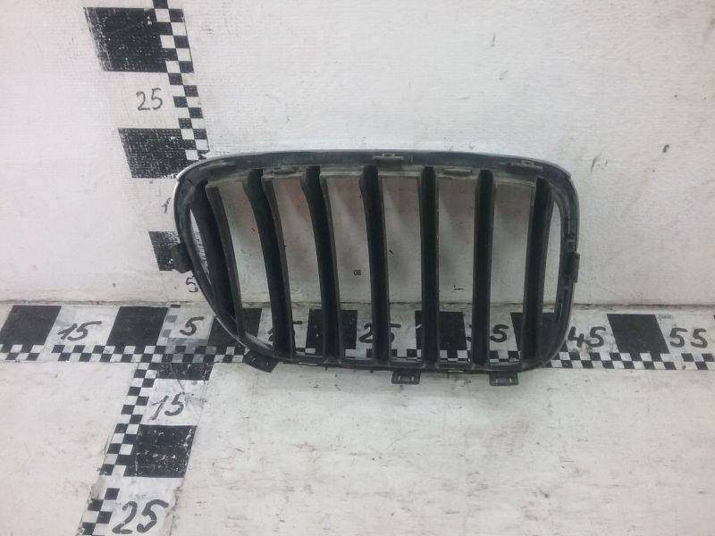 Решетка радиатора левая