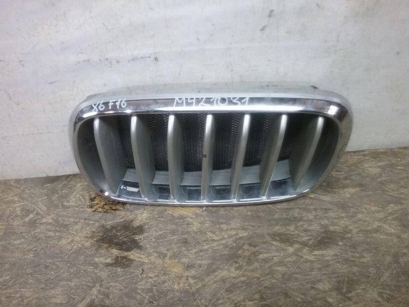 Решетка радиатора левая