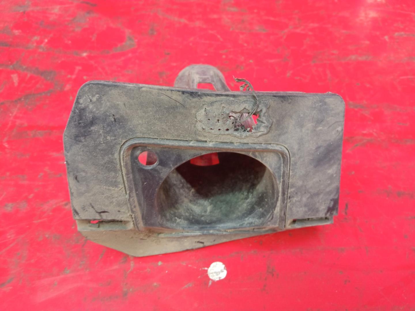 Кронштейн форсунки омывателя фары