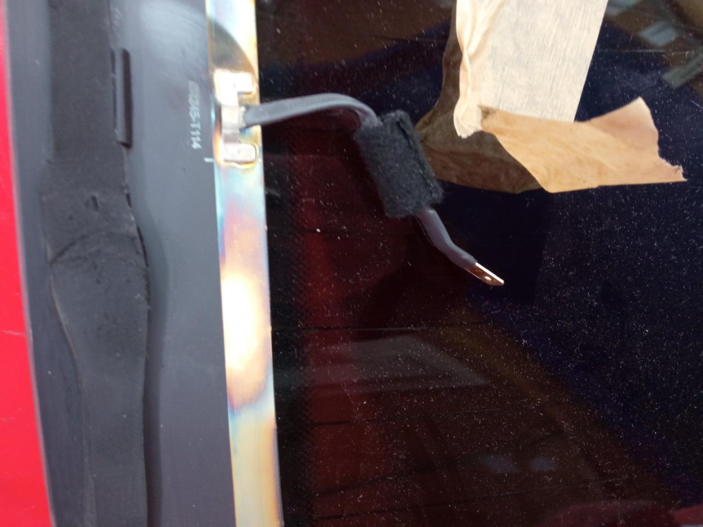 Стекло двери багажника