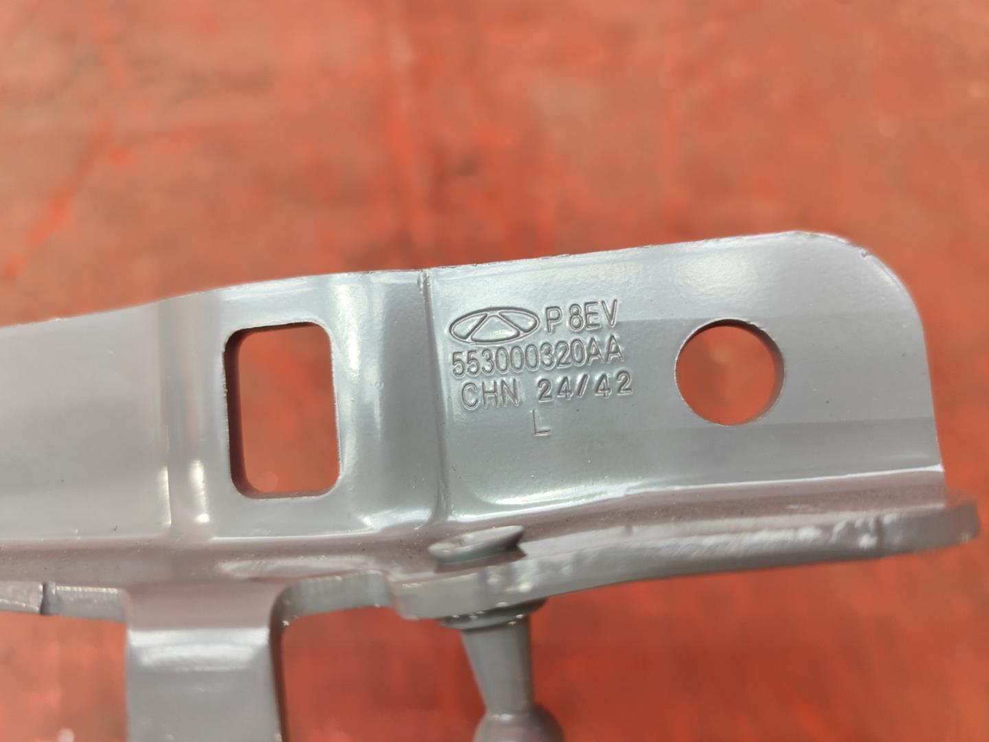 Петля капота