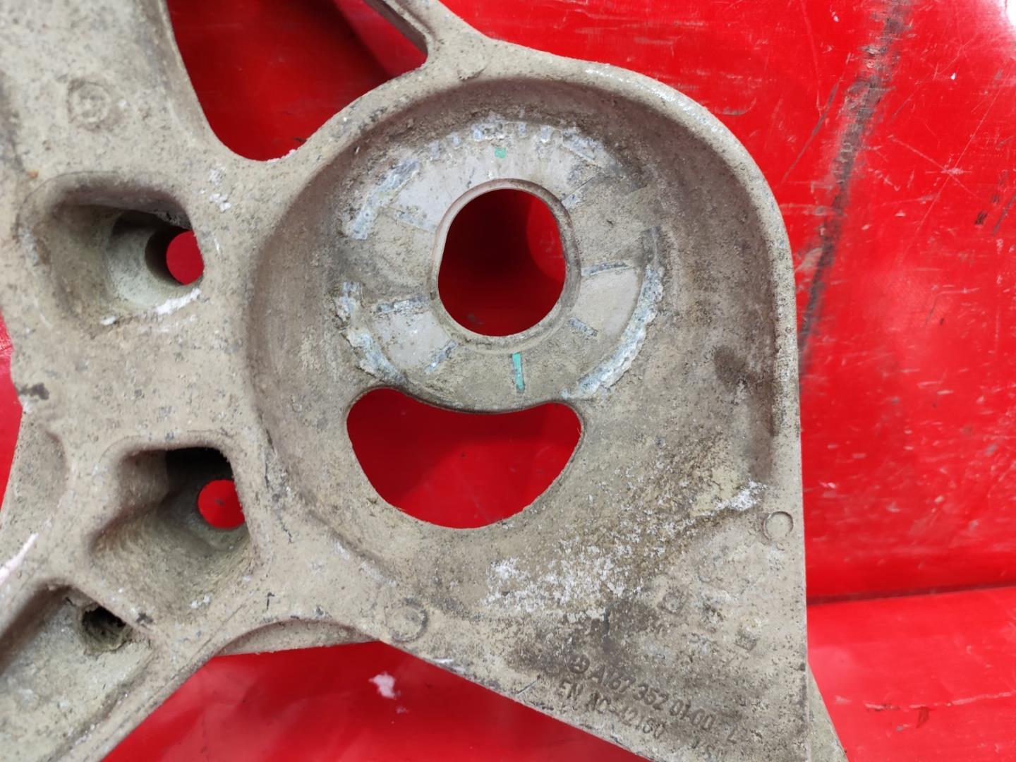 Рычаг передний нижний