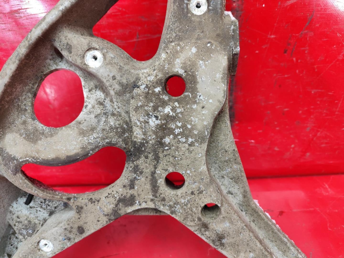 Рычаг передний нижний