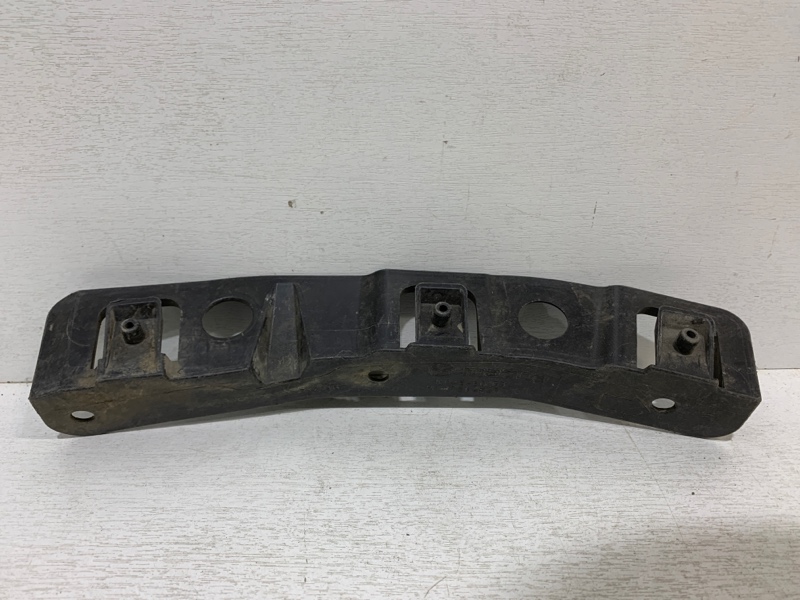 Кронштейн переднего бампера левый