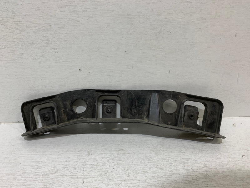 Кронштейн переднего бампера левый