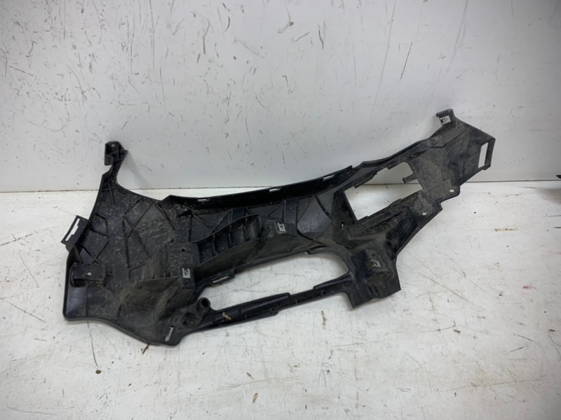 Кронштейн переднего бампера правый