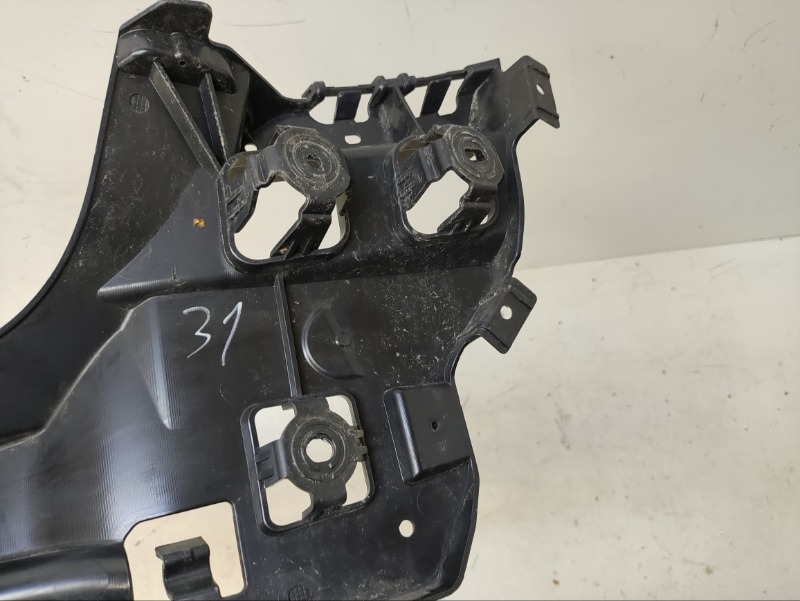 Кронштейн заднего бампера левый