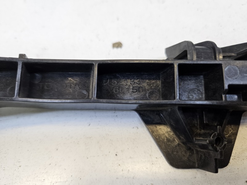 Кронштейн фар правый