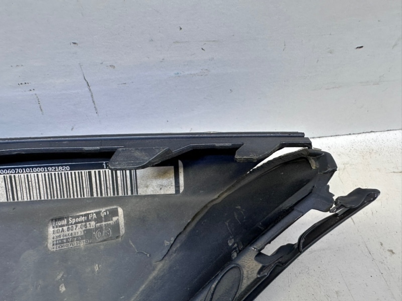 Спойлер переднего бампера левый