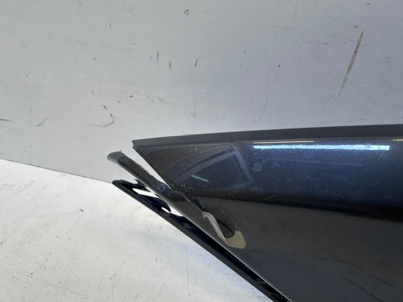 Спойлер переднего бампера левый