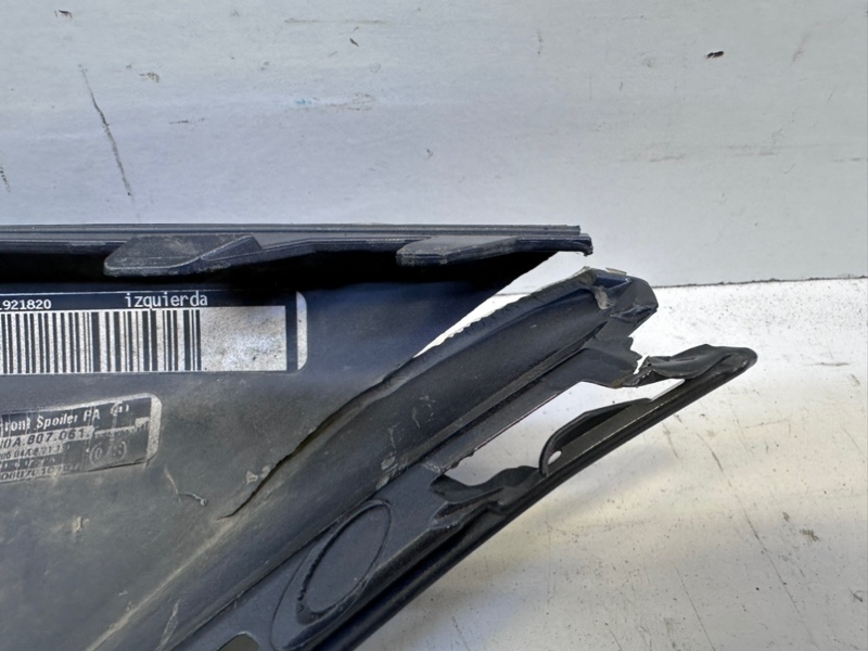 Спойлер переднего бампера левый