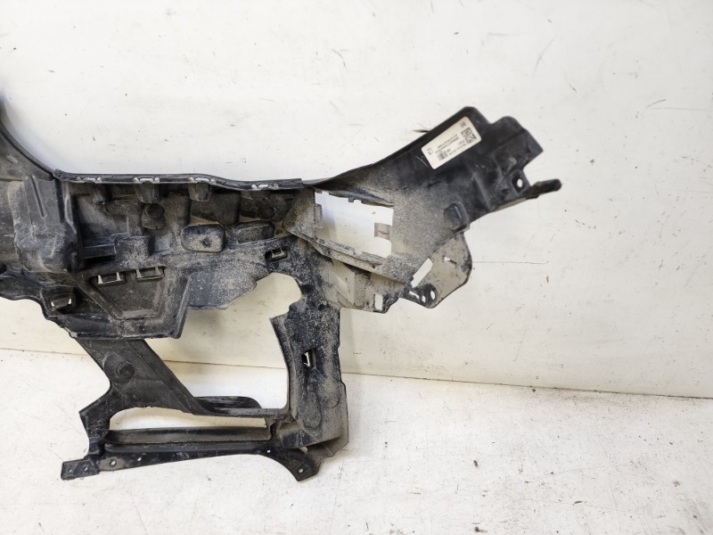 Кронштейн переднего бампера правый