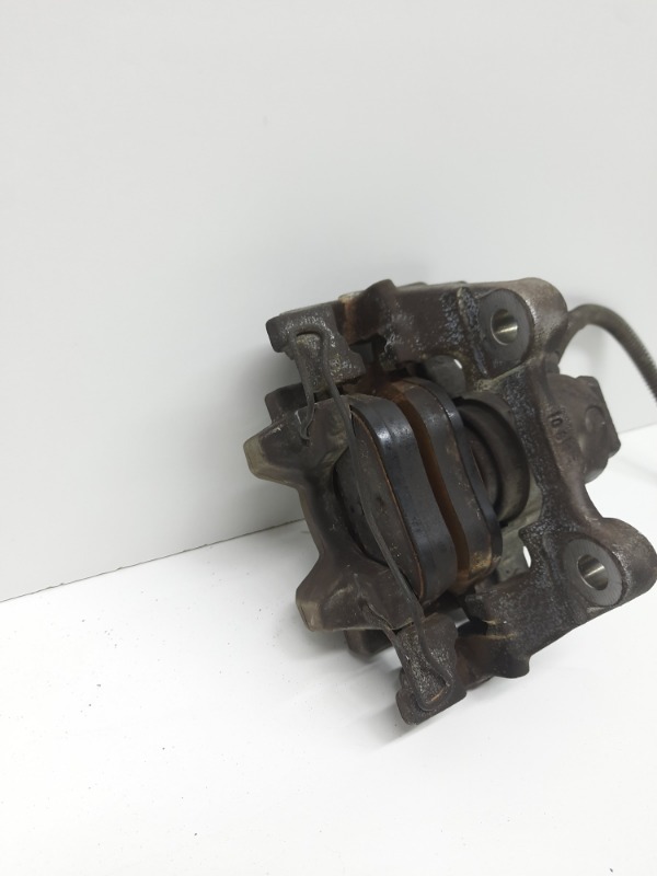 Суппорт задний левый