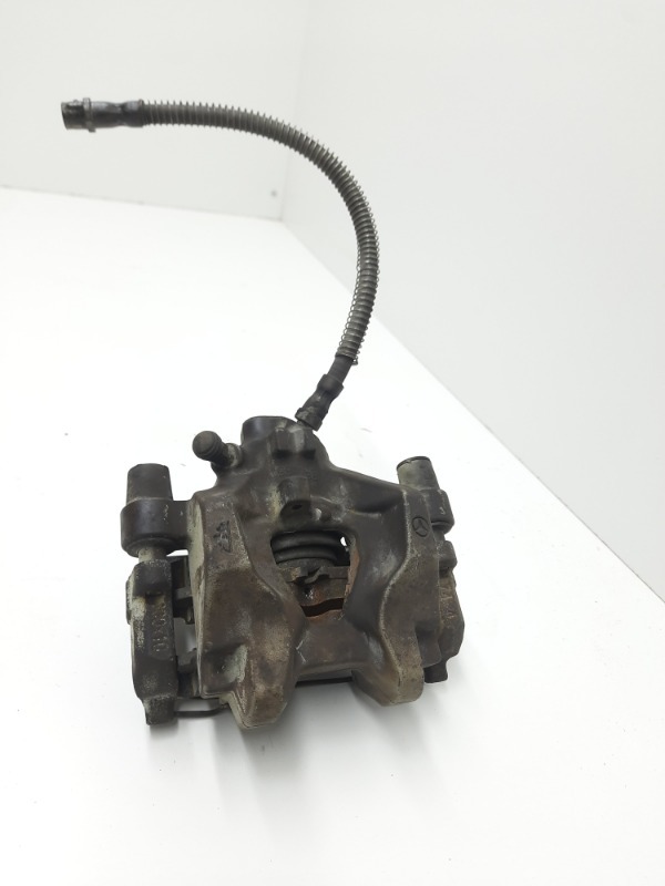 Суппорт задний левый