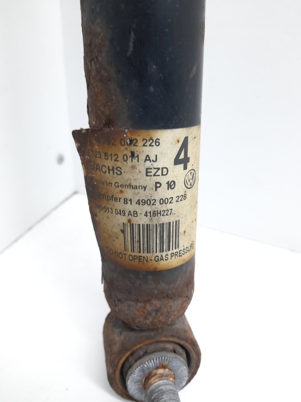 Амортизатор задний левый