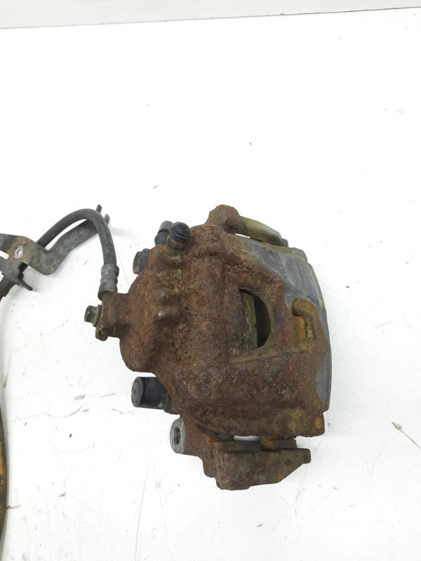 Суппорт передний левый