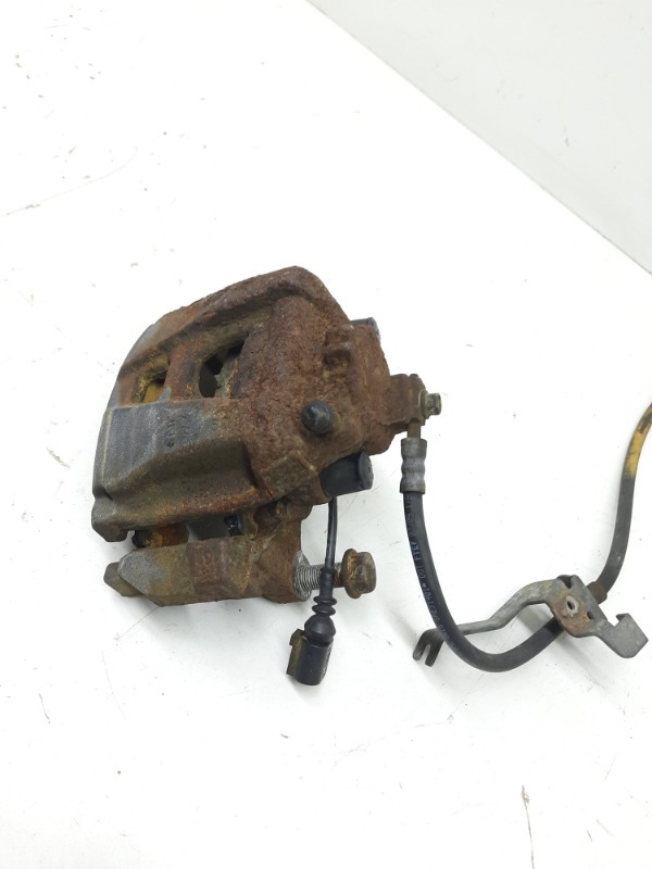 Суппорт передний левый