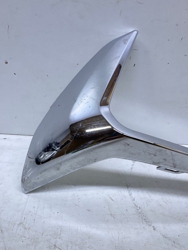 Кронштейн фар левый