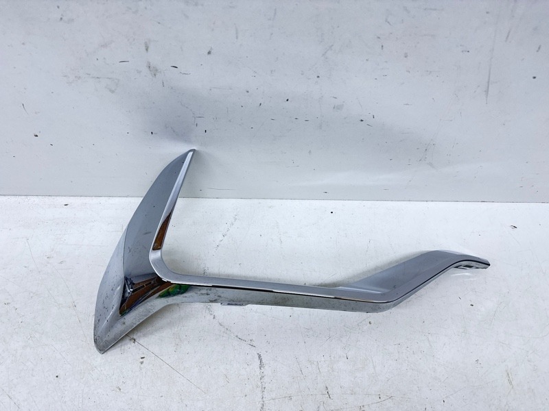 Кронштейн фар левый