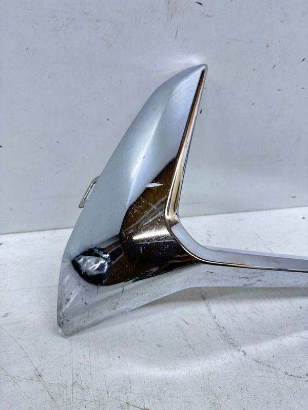 Кронштейн фар левый