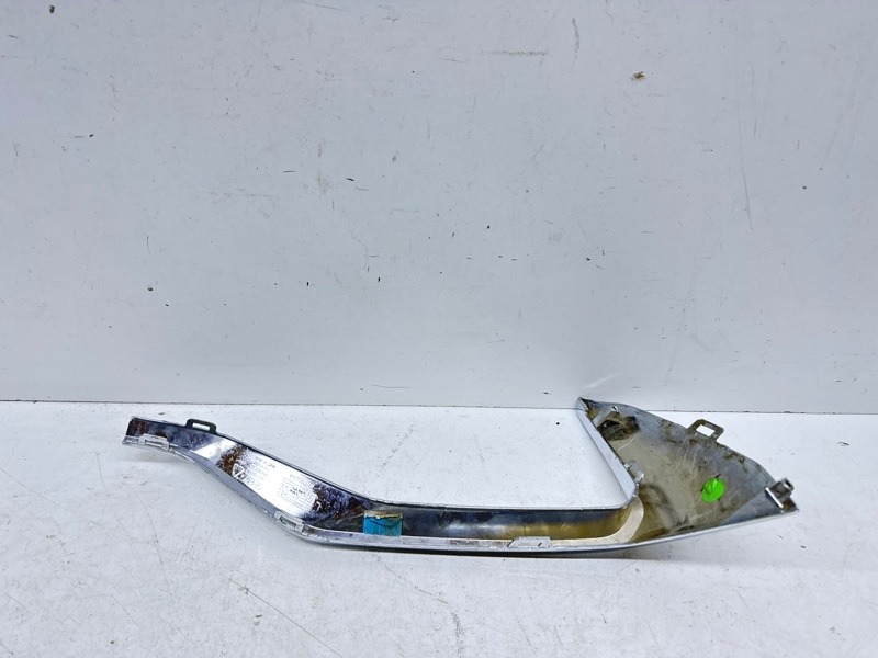 Кронштейн фар левый