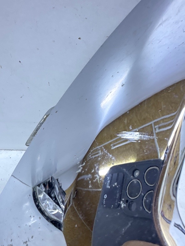 Кронштейн фар левый