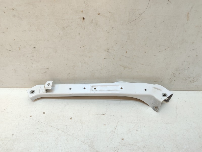 Кронштейн фар левый