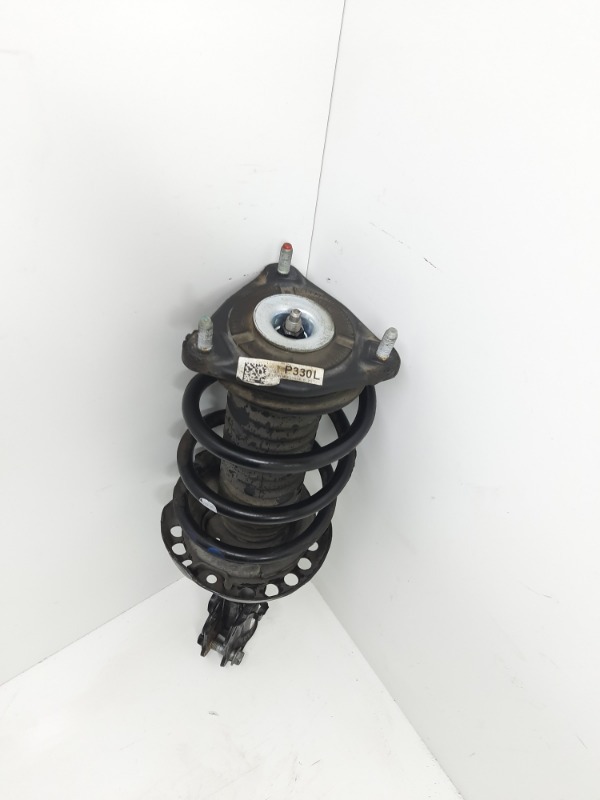 Амортизатор передний левый