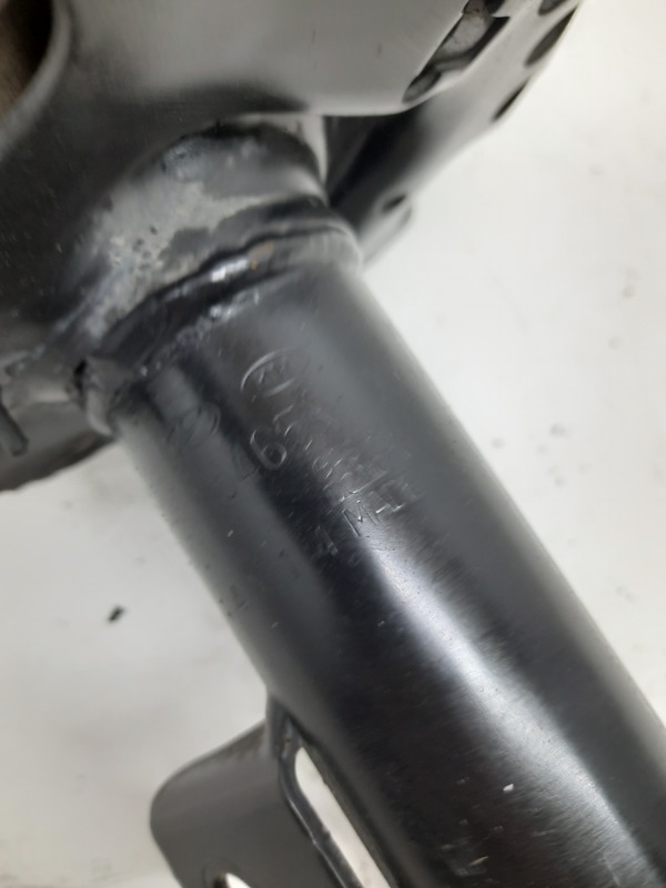 Амортизатор передний левый