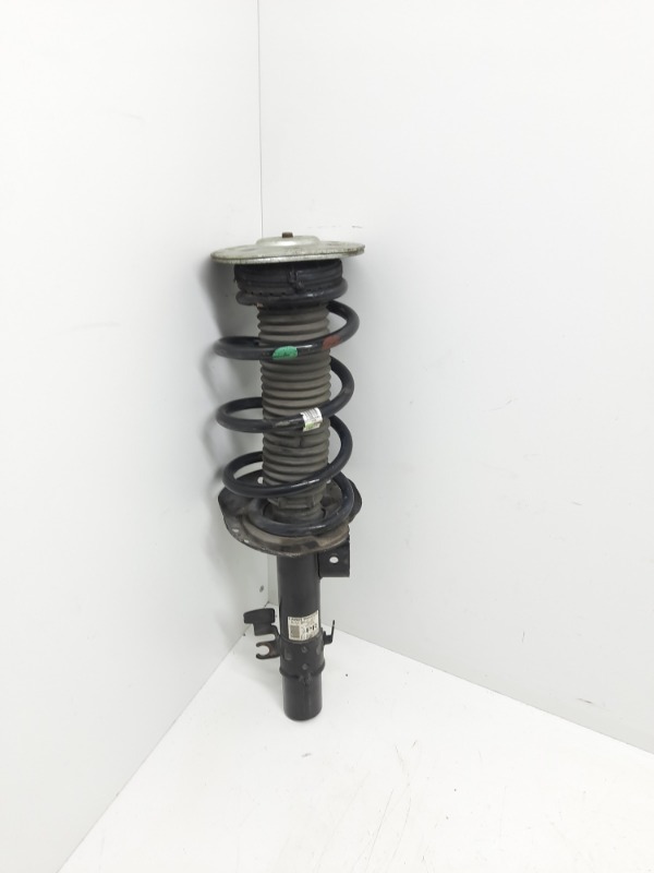 Амортизатор передний левый