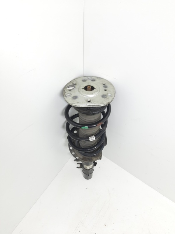 Амортизатор передний левый