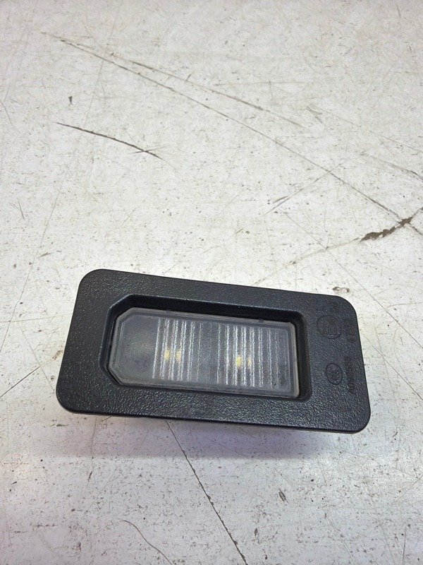 Фонарь подсветки номера