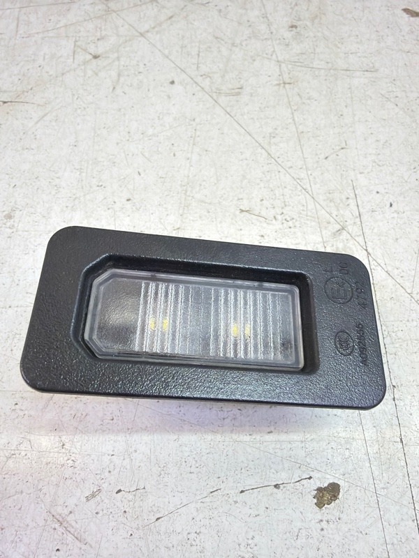 Фонарь подсветки номера