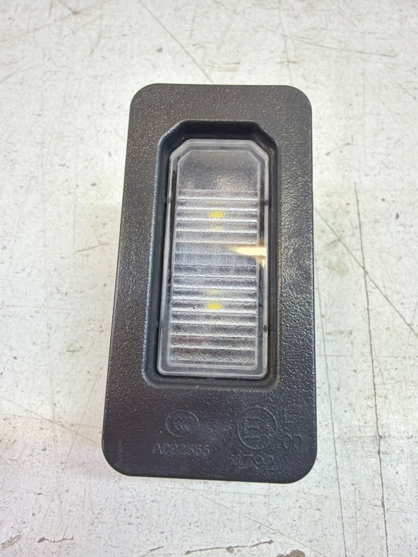 Фонарь подсветки номера