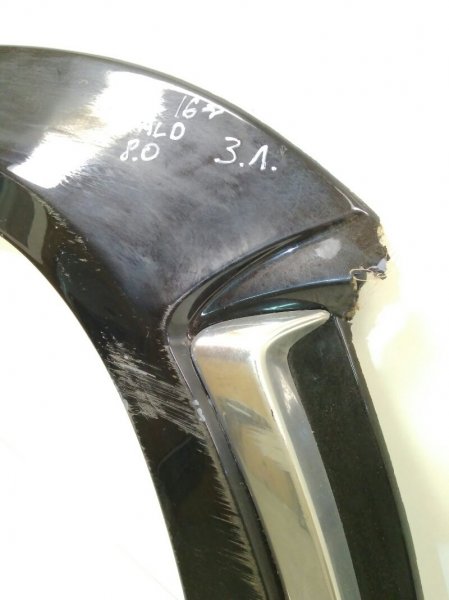 Накладка заднего крыла левого