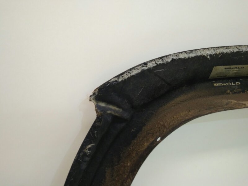 Накладка заднего крыла левого